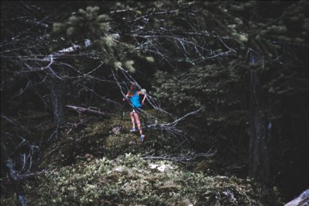 A Person in a Forest to Trail Run