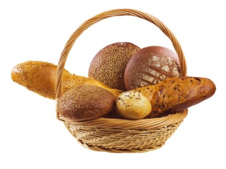 A basket containing several kinds of breads and buns