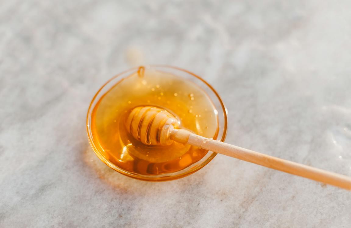 Honey in a Transparent Bowl